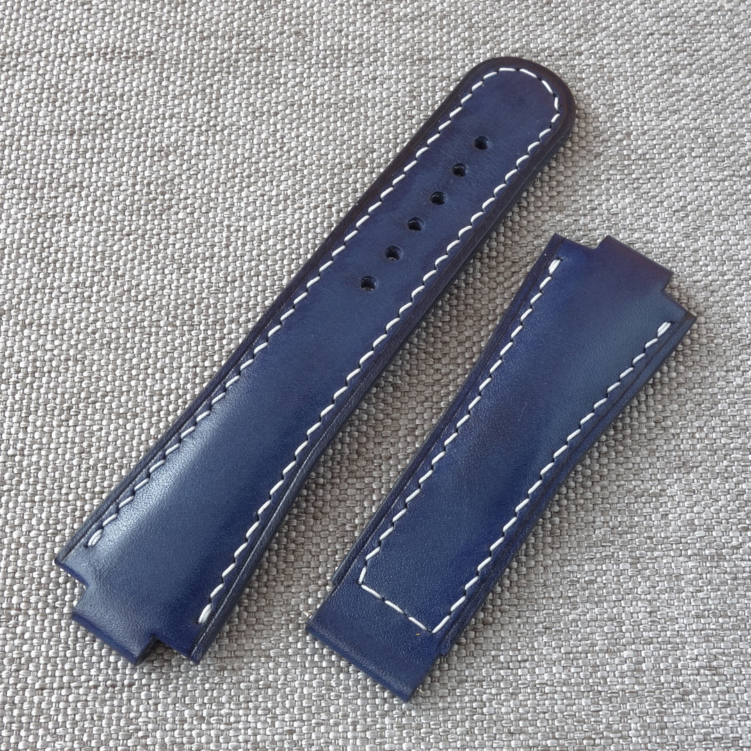 Blue leather watch strap, fits the original ORIS Aquis deployment clasp. 100% handmade, replacement watchband. Made of the high quality genuine leather. It is possible to produce a strap of any color and size, as desired by the customer. For ORIS Aquis watches: 39.5mm/ 41.5mm Calibre 400/ 43.5mm/ 43mm/ 45.5mm/ 46mm, Divers, Aquis Date, TT1, F1, Other Oris Models.