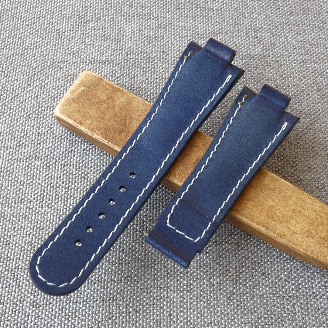 Blue leather watch strap, fits the original ORIS Aquis deployment clasp. 100% handmade, replacement watchband. Made of the high quality genuine leather. It is possible to produce a strap of any color and size, as desired by the customer. For ORIS Aquis watches: 39.5mm/ 41.5mm Calibre 400/ 43.5mm/ 43mm/ 45.5mm/ 46mm, Divers, Aquis Date, TT1, F1, Other Oris Models.