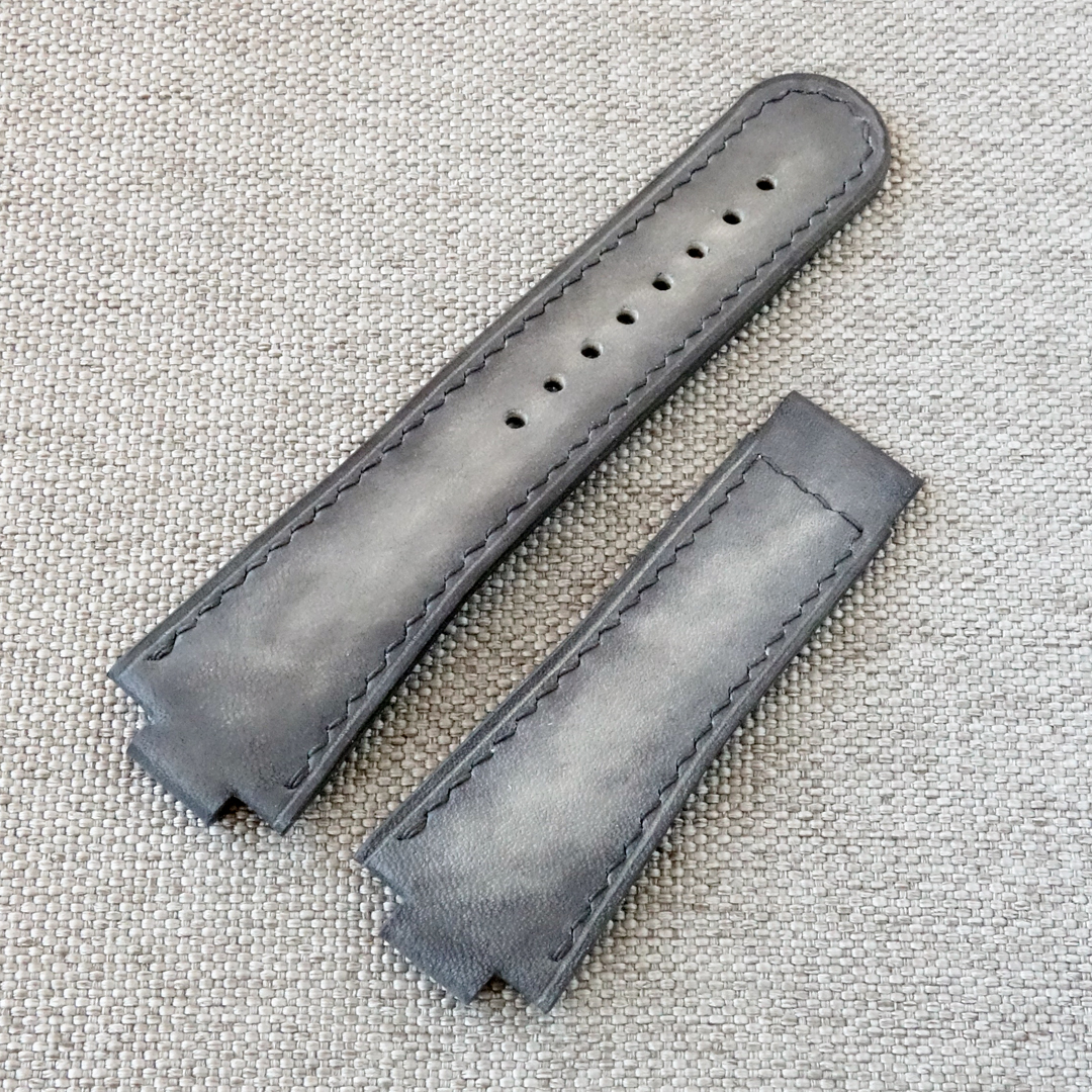 Grey leather watch strap, fits the original ORIS Aquis deployment clasp. 100% handmade, replacement watchband. Made of the high quality genuine leather. It is possible to produce a strap of any color and size, as desired by the customer. For ORIS Aquis watches: 39.5mm/ 41.5mm Calibre 400/ 43.5mm/ 43mm/ 45.5mm/ 46mm, Divers, Aquis Date, TT1, F1, Other Oris Models.