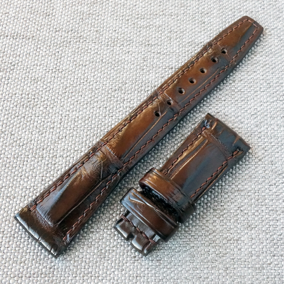 Brown crocodile leather watch strap. Handmade replacement watchband. Made of crocodile / alligator leather. The soft and durable leather has a unique pattern, special for each strap. Cassic style, fits most watches. This will be a good addition to your Apple watch, Rolex, Cartier, Patek Philippe, Breguet Tudor, Omega, Longines, Tissot, Orient, Seiko, IWC, TAG Heuer, Hamilton, Timex, Casio and many many other beautiful watch brands.