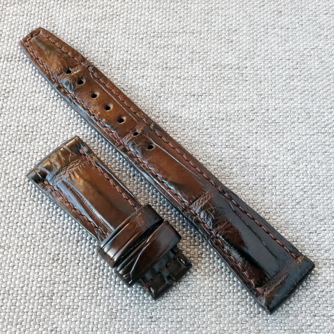 Brown crocodile leather watch strap. Handmade replacement watchband. Made of crocodile / alligator leather. The soft and durable leather has a unique pattern, special for each strap. Cassic style, fits most watches. This will be a good addition to your Apple watch, Rolex, Cartier, Patek Philippe, Breguet Tudor, Omega, Longines, Tissot, Orient, Seiko, IWC, TAG Heuer, Hamilton, Timex, Casio and many many other beautiful watch brands.